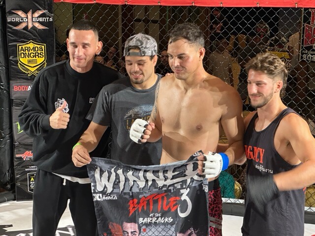 x1-59 team Max Holloway